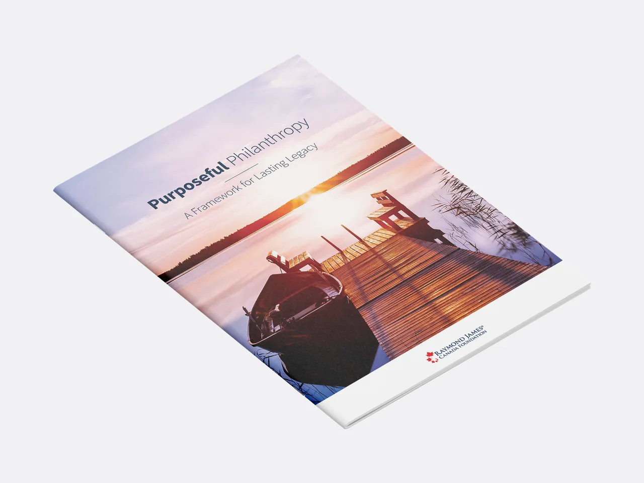 Angled mockup of the Purposeful Philanthropy guide cover with a dock and rowboat at sunset